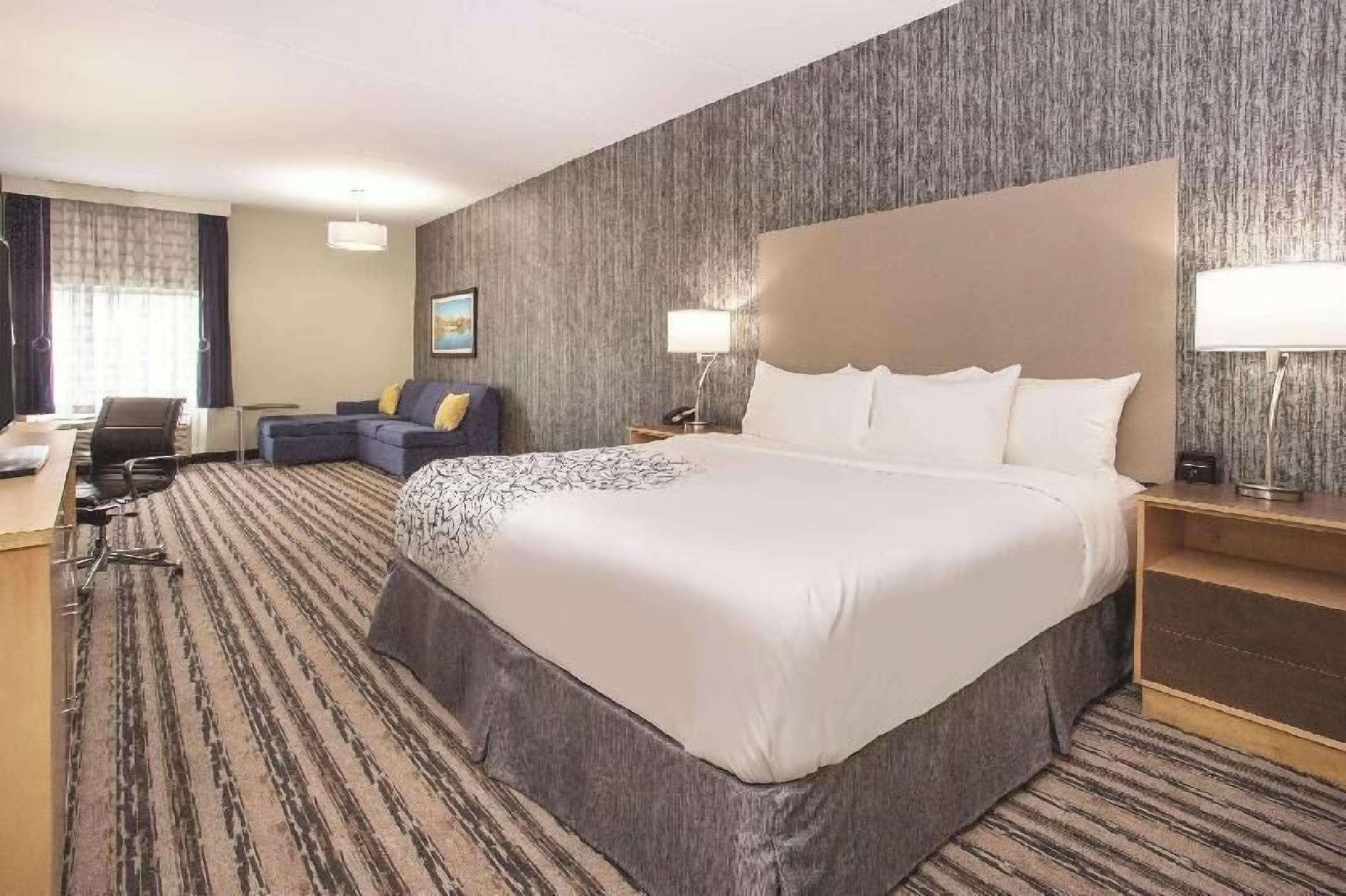 Premium bedding, pillowtop beds, desk, blackout drapes