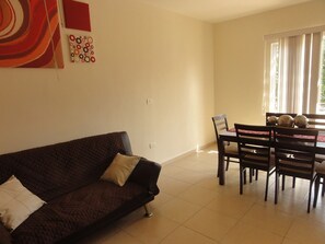 Apartment | Living area | Flat-screen TV - Alegro 305 by RentingPlaya (Playa del Carmen)