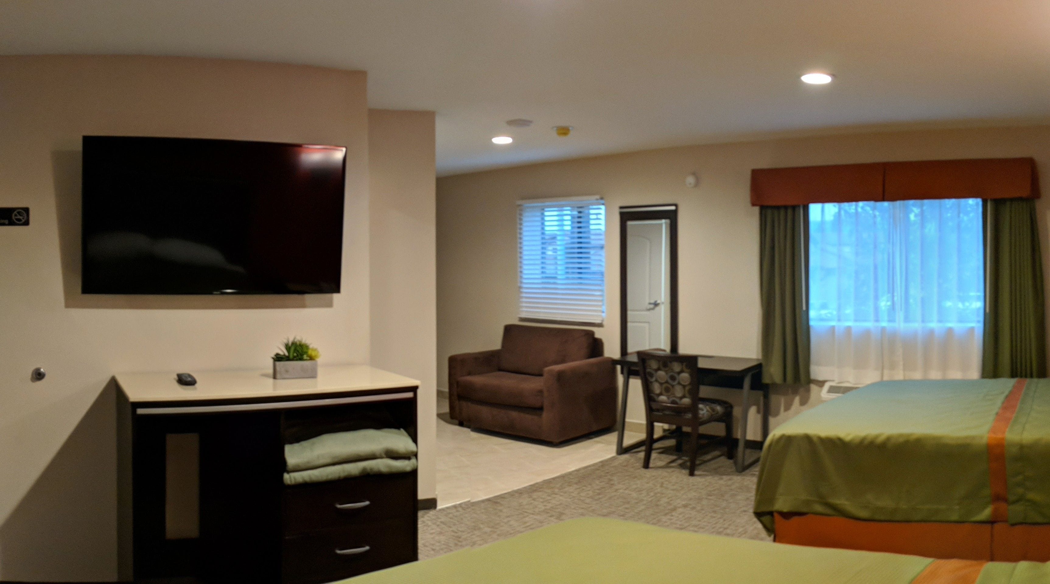 Standard-huone, useita sänkyjä | Työpöytä, pimennysverhot, silitysrauta/-lauta, ilmainen Wi-Fi