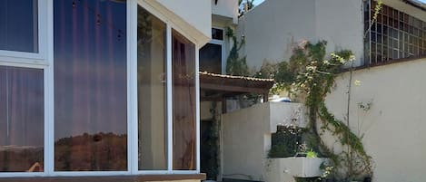 Quarto família, várias camas, para não fumantes | Terraço/pátio