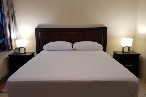Classic Quadruple Room, Multiple Beds, Non Smoking | Iron/ironing board, free WiFi, bed sheets