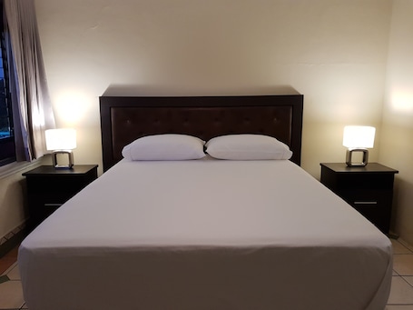 Classic Quadruple Room, Multiple Beds, Non Smoking | Iron/ironing board, free WiFi, bed sheets