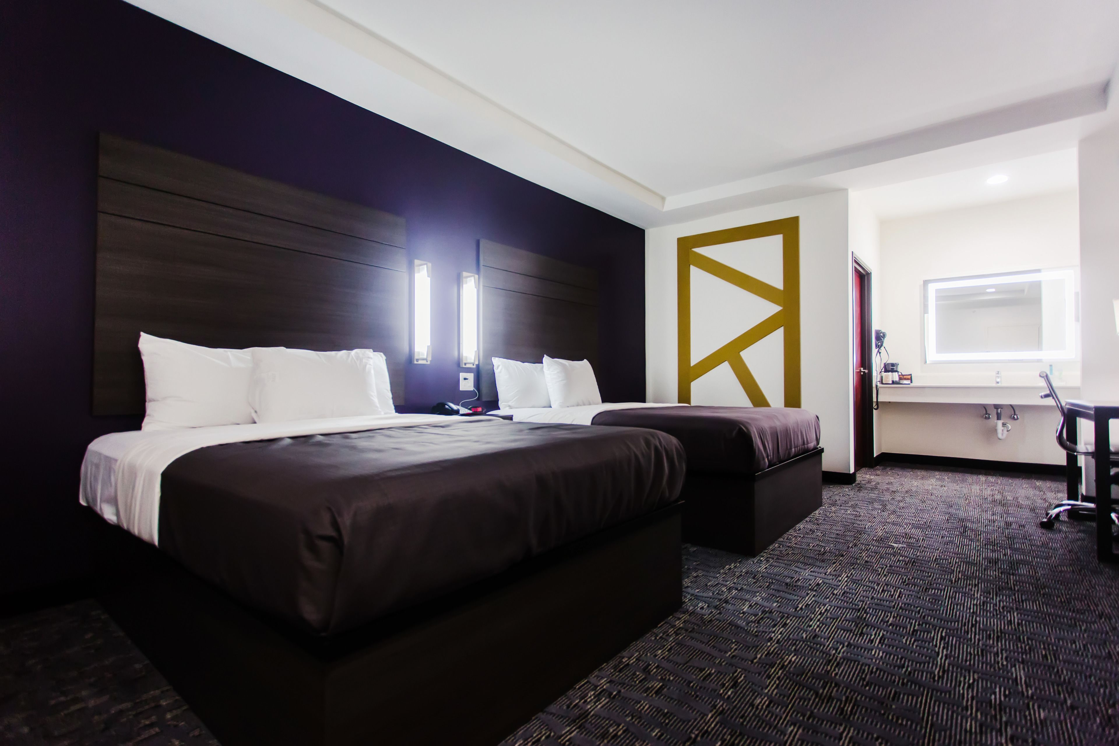 basic double room, 2 queen beds | desk, laptop workspace, blackout curtains, free cots/infant beds