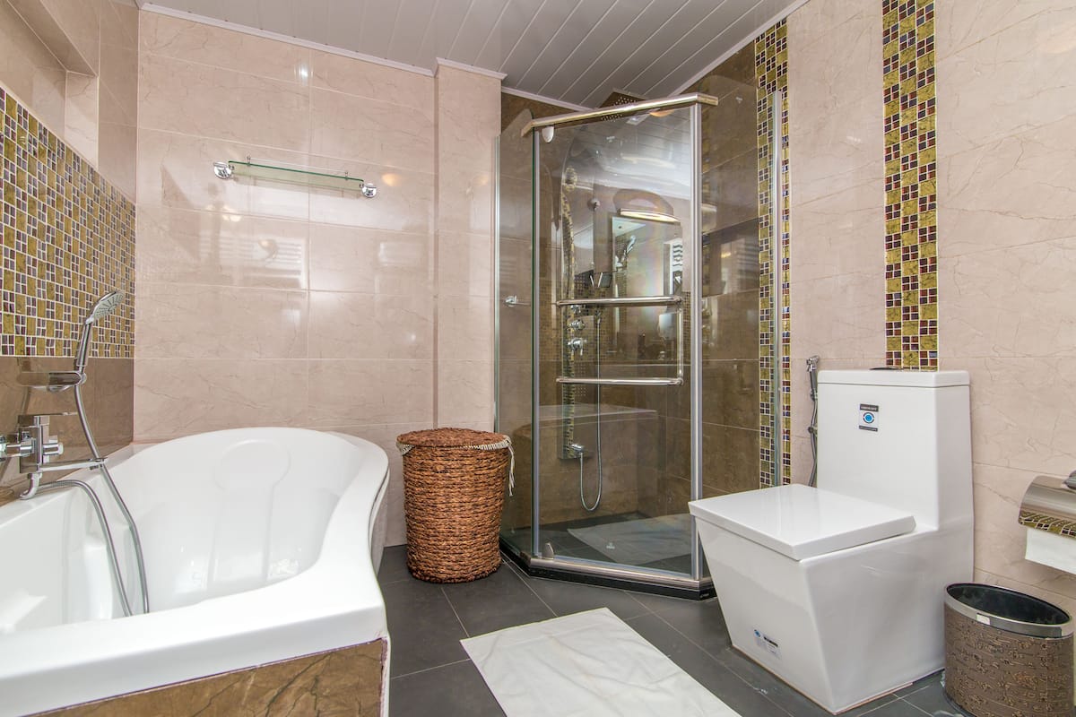 quadruple room | bathroom | designer toiletries, hair dryer, towels