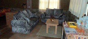 Suite, diversos llits | Sala d'estar