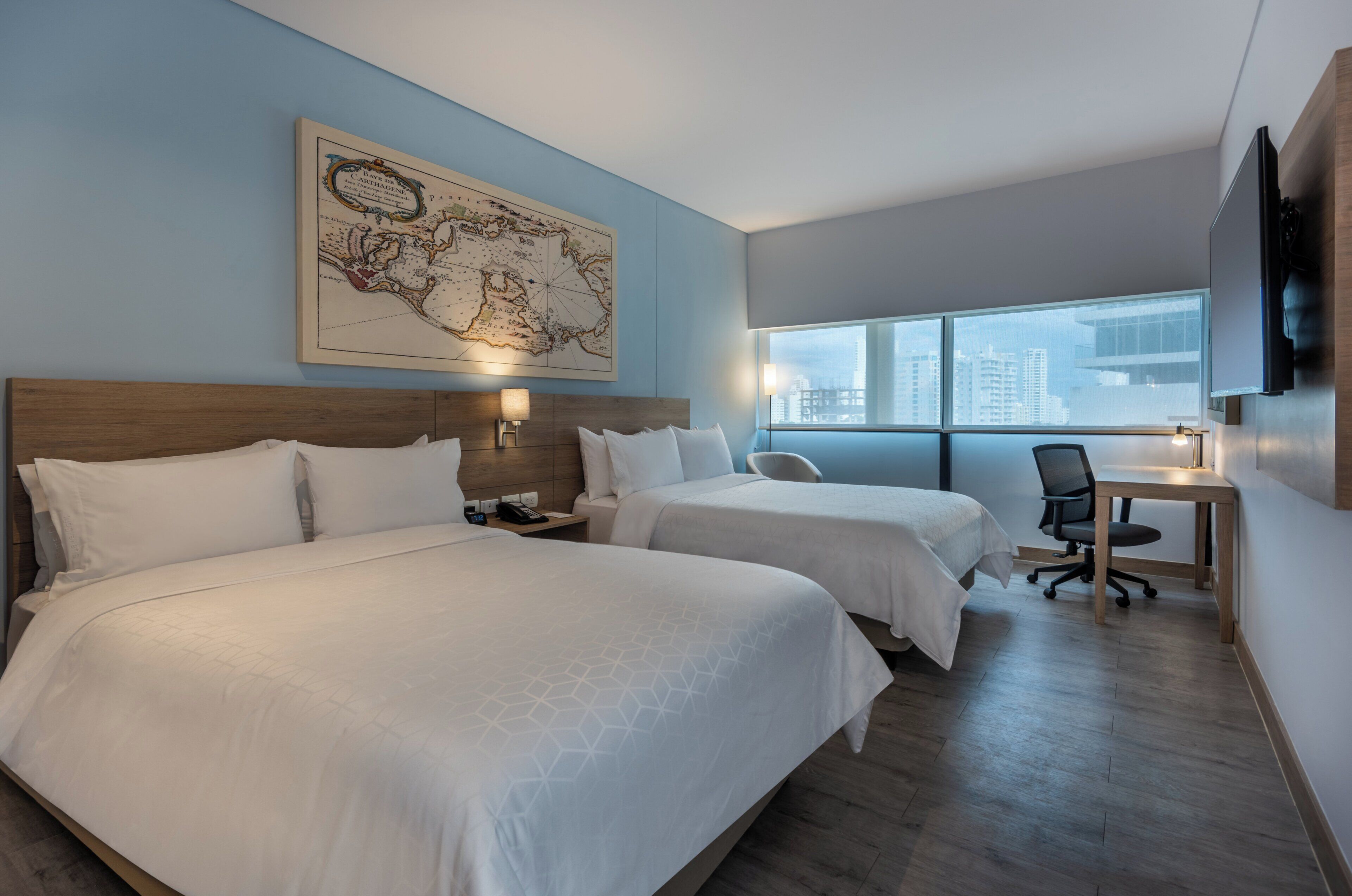 Premium bedding, down duvets, pillow-top beds, in-room safe
