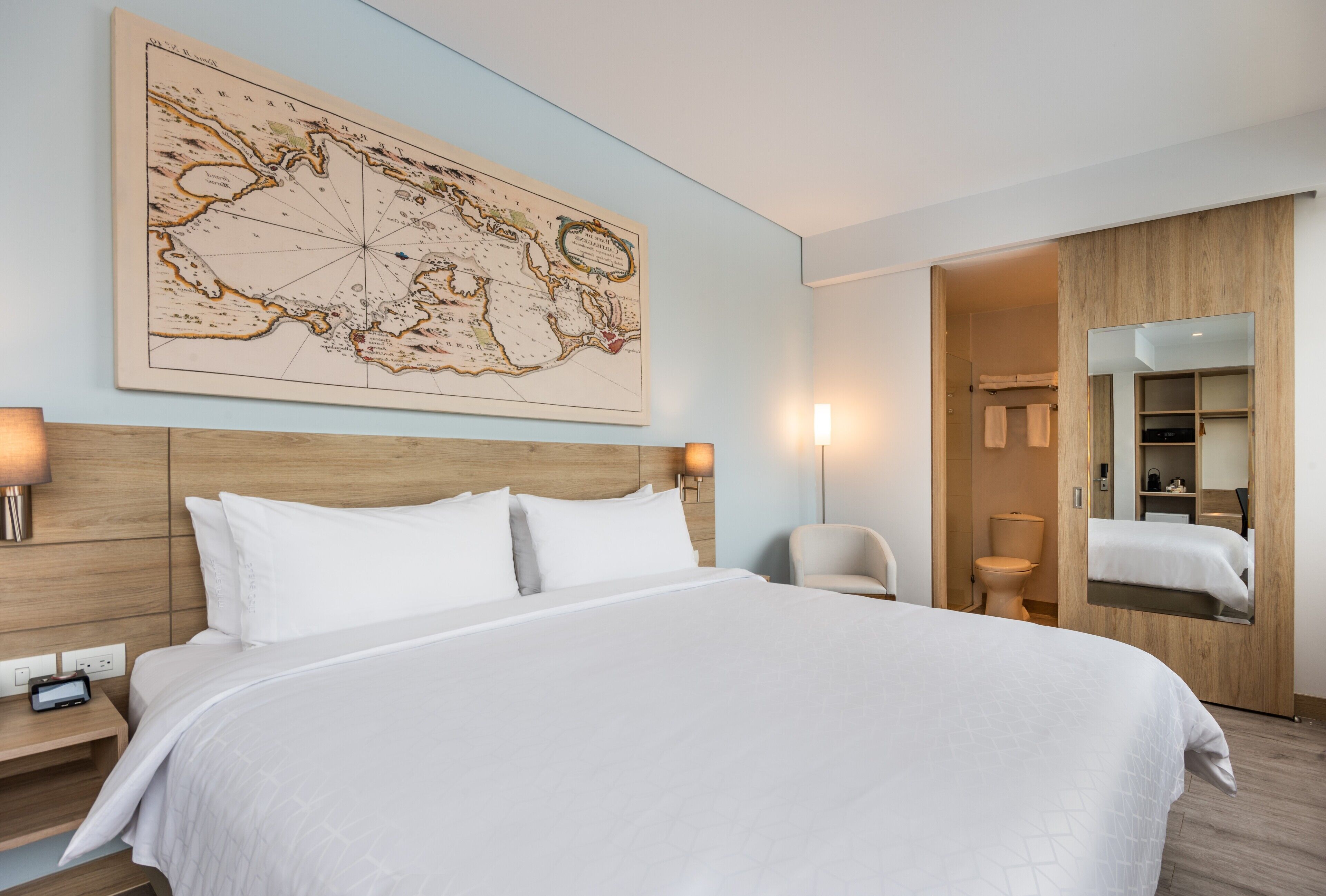 Premium bedding, down comforters, pillowtop beds, in-room safe