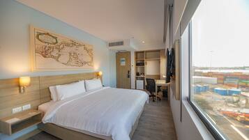 Premium bedding, down comforters, pillowtop beds, in-room safe