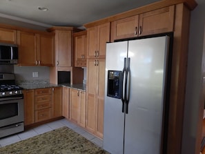 Fridge, microwave, oven, stovetop - Newly Remodeled and Brand New Furniture, (Biloxi)