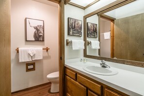 Bathtub, hair dryer, towels