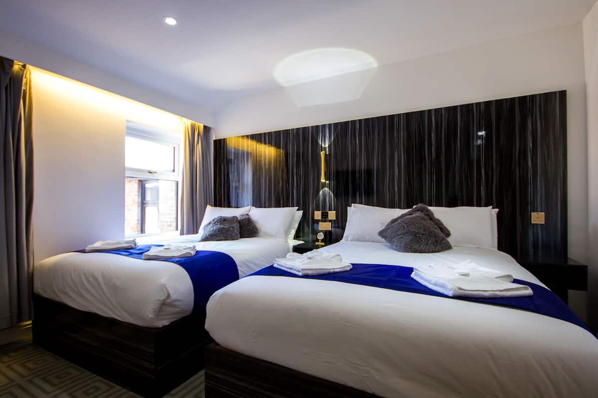Family Room, 2 Double Beds | Desk, WiFi (free)