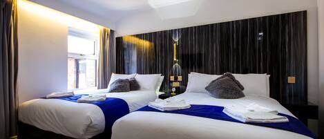 Family Room, 2 Double Beds | Desk, free WiFi