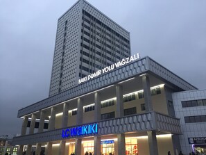 A modern building with a prominent sign for "LC Waikiki". - Hotel 28 (Baku)