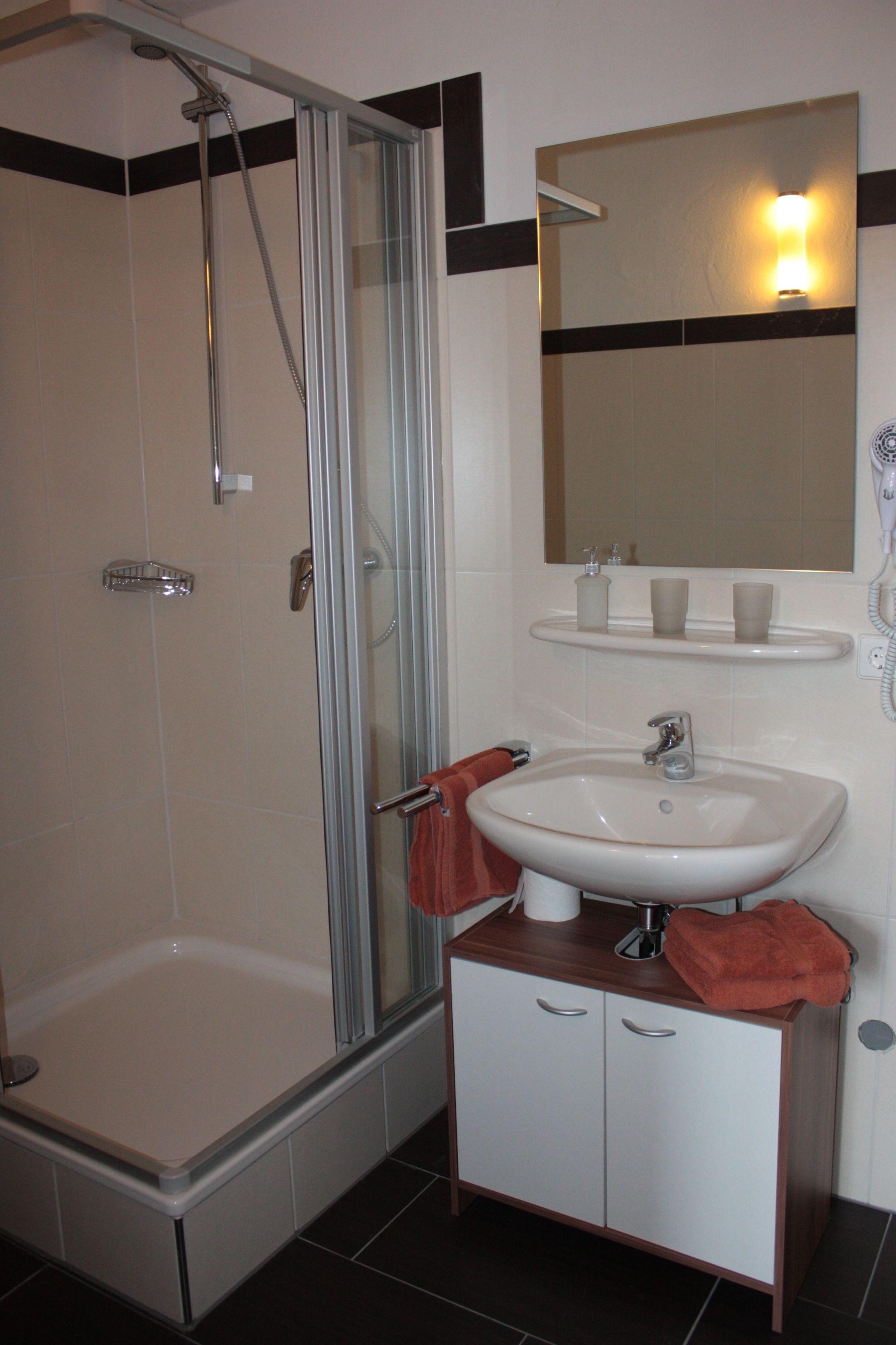 deluxe apartment, non smoking, kitchen | bathroom | rainfall showerhead, hair dryer, towels, soap