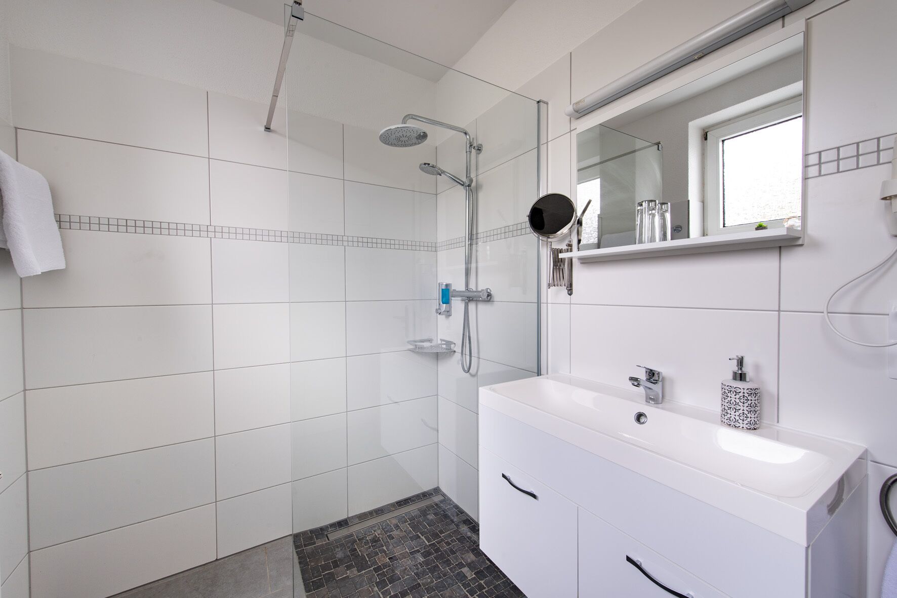 single room | bathroom | shower, hair dryer, towels, soap