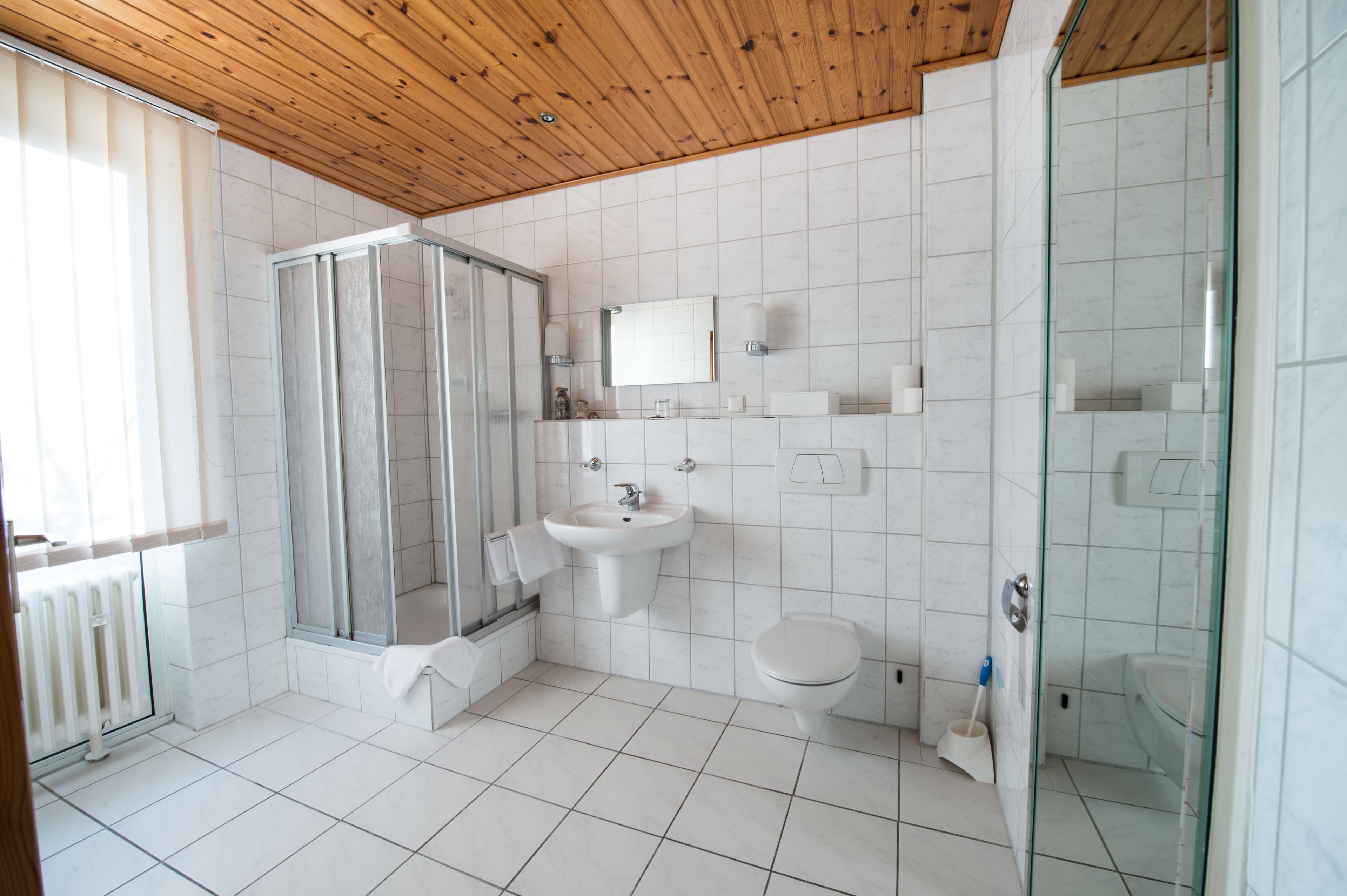 twin room | bathroom | shower, hair dryer, towels, soap