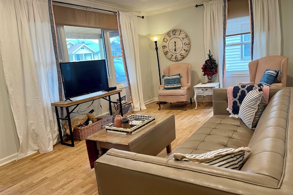 Relax on the soft leather couch and enjoy your smart TV after your day.