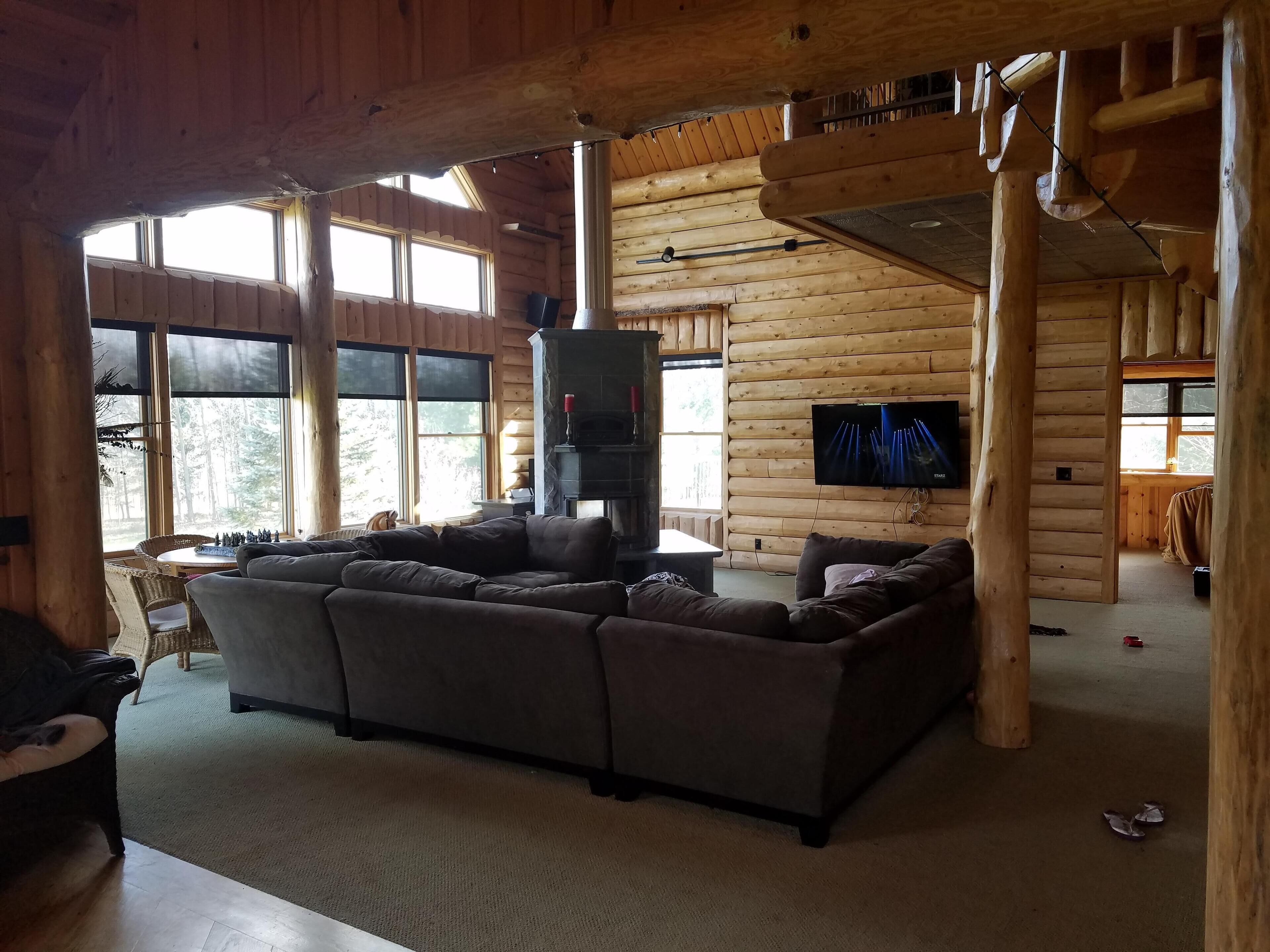 Great room, great couch, great fireplace, great spot!