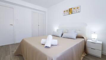 3 dormitorios, tabla de planchar con plancha, wifi gratis y ropa de cama