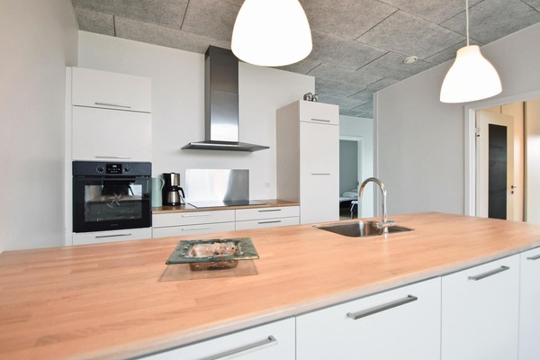 Fridge, stovetop, dishwasher, coffee/tea maker