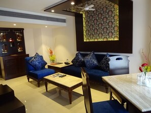 Family Suite, 1 Queen Bed | Living area | Flat-screen TV, pay movies - Hotel Landmark (Gwalior)