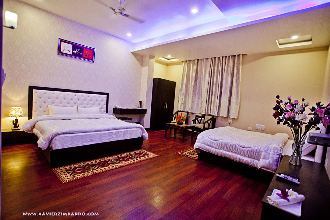 Deluxe Quadruple Room, Multiple Beds | In-room safe, desk, rollaway beds, free WiFi