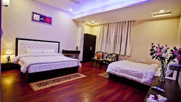 Deluxe Quadruple Room, Multiple Beds | In-room safe, desk, rollaway beds, free WiFi