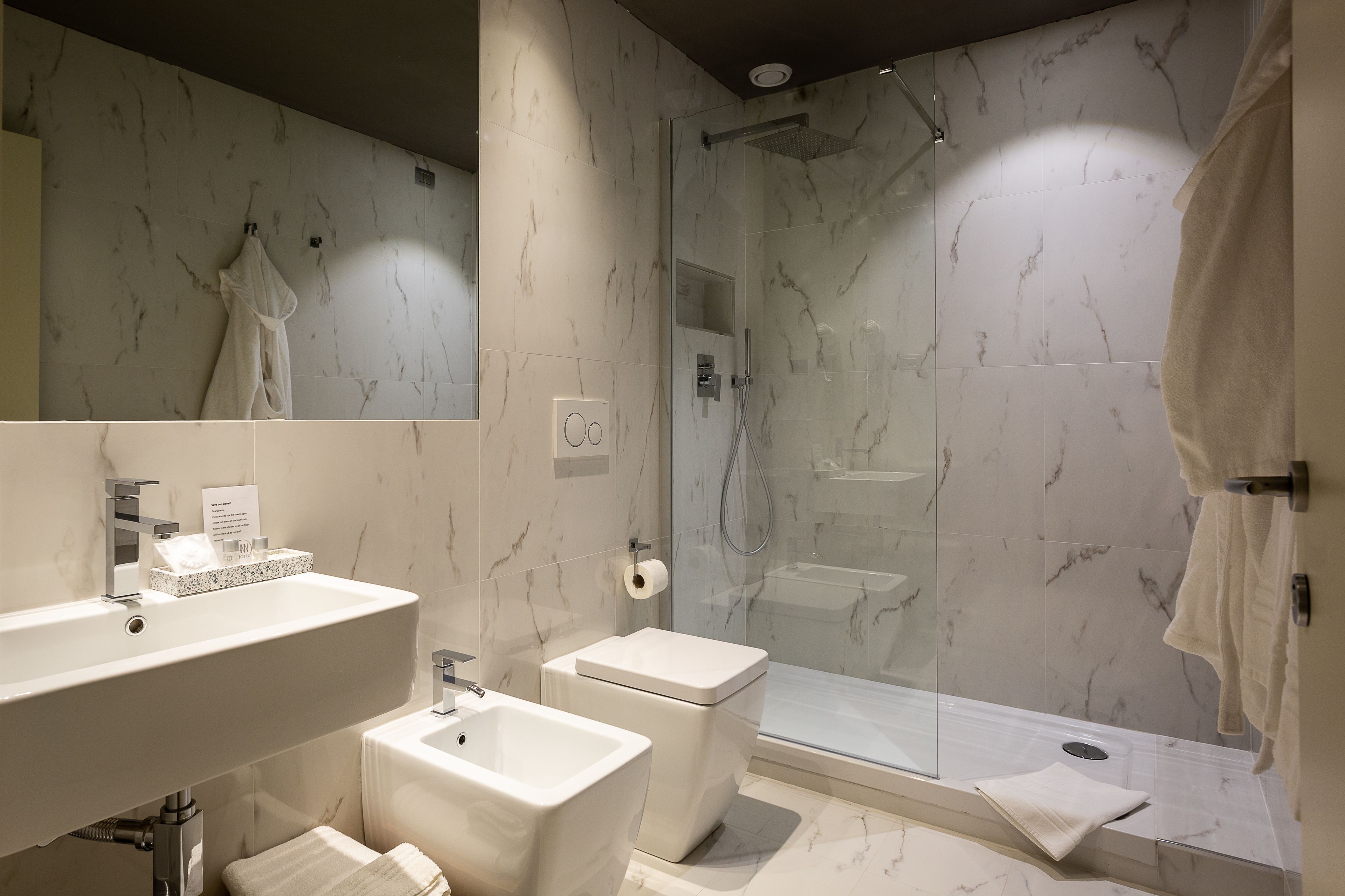 shower, hair dryer, bathrobes, slippers