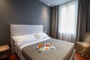 Suíte júnior | Frigobar, cofres nos quartos, escrivaninha