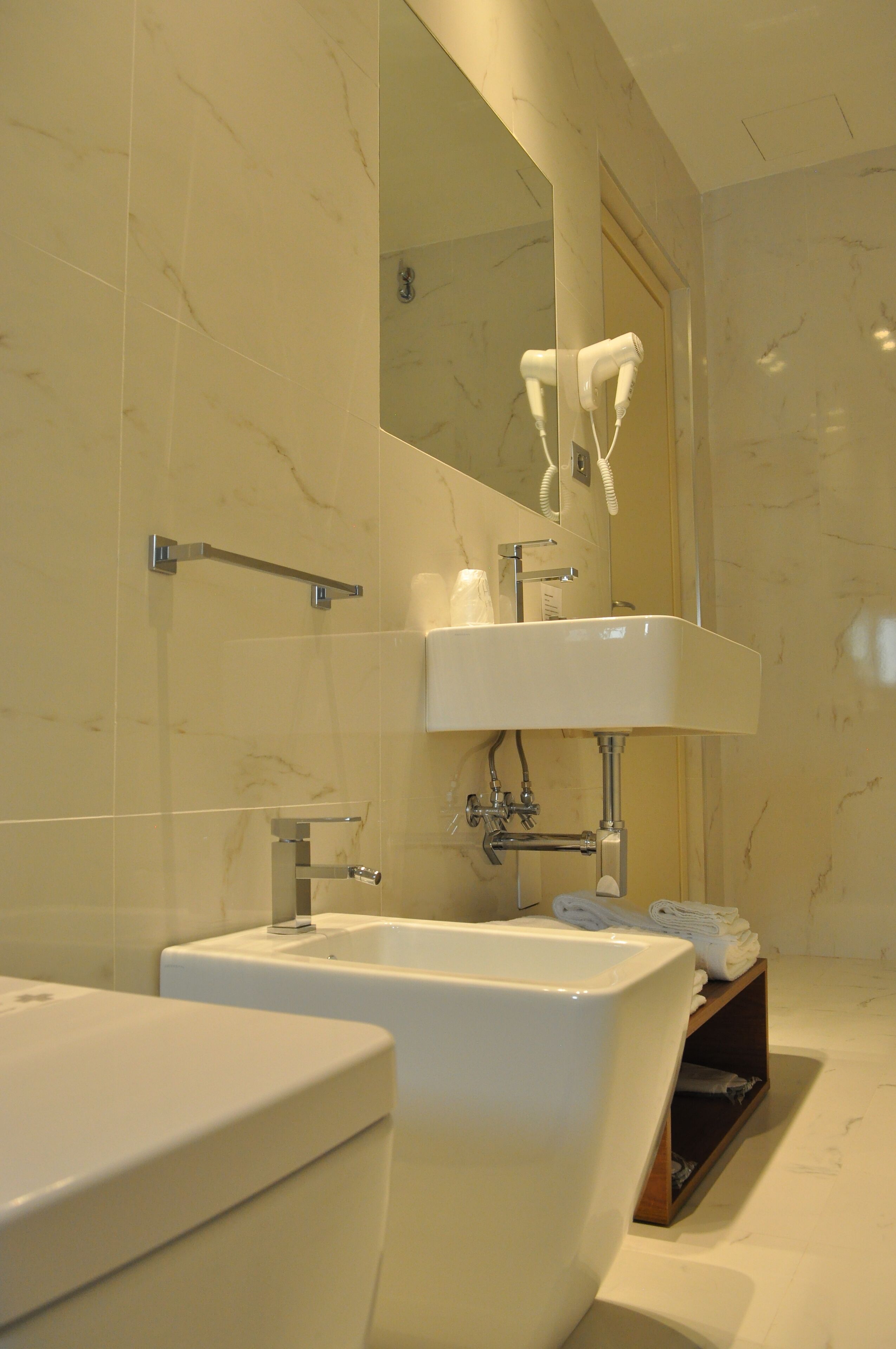 junior suite | bathroom | shower, hair dryer, bathrobes, slippers