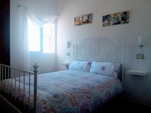 2 quartos, berço de viagem, Wi-Fi de cortesia, roupa de cama