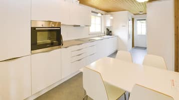 Fridge, stovetop, dishwasher, coffee/tea maker