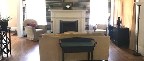 Smart TV, fireplace, books