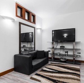 City Apartment, 2 Bedrooms | Living area | Flat-screen TV