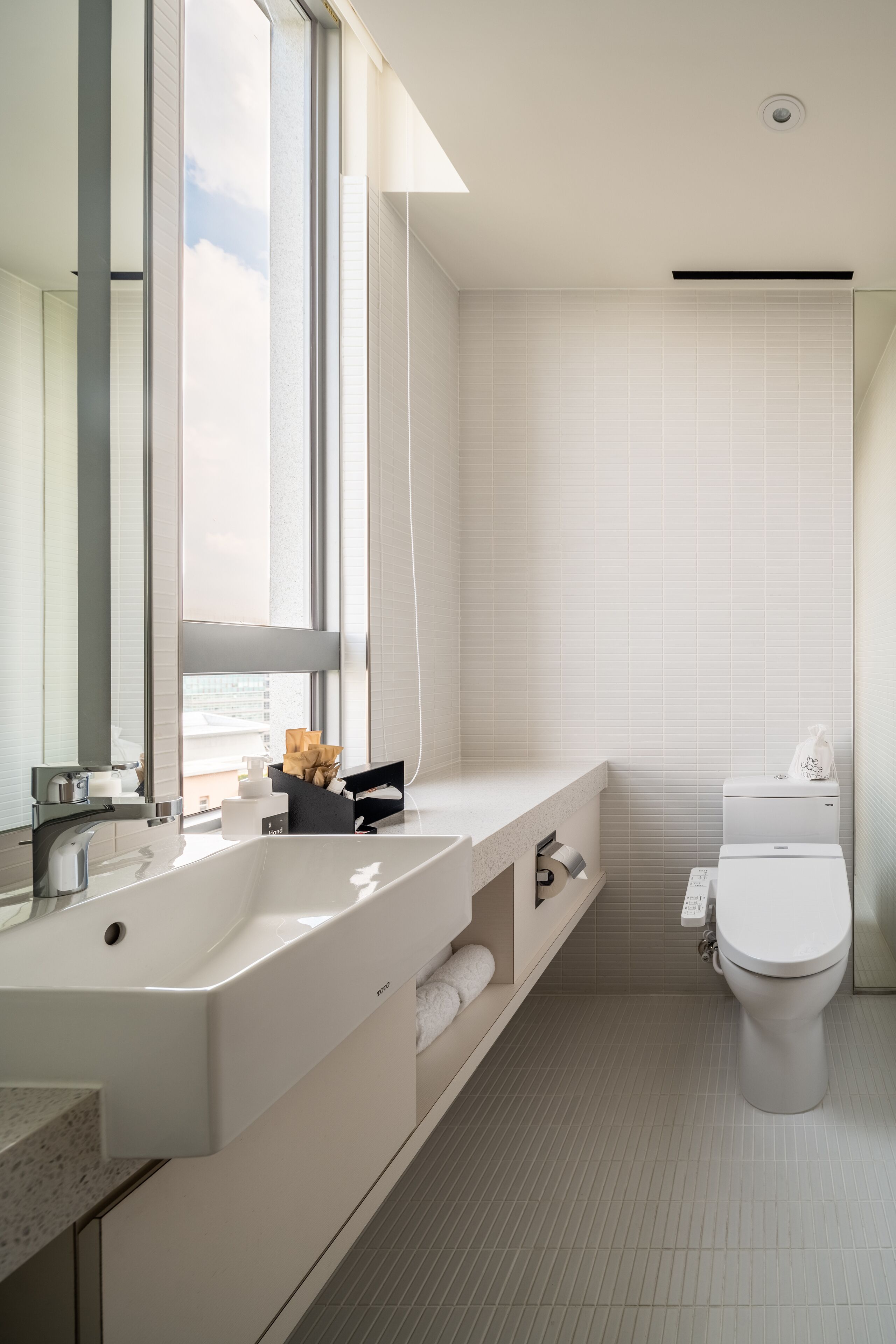 superior double room | bathroom | hair dryer, slippers, towels, soap