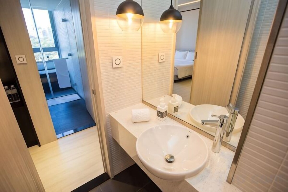 Bathroom | Hair dryer, slippers, towels, soap