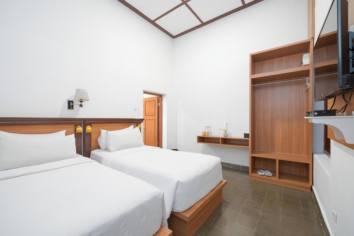 Habitación Deluxe con 2 camas individuales | Escritorio y wifi gratis