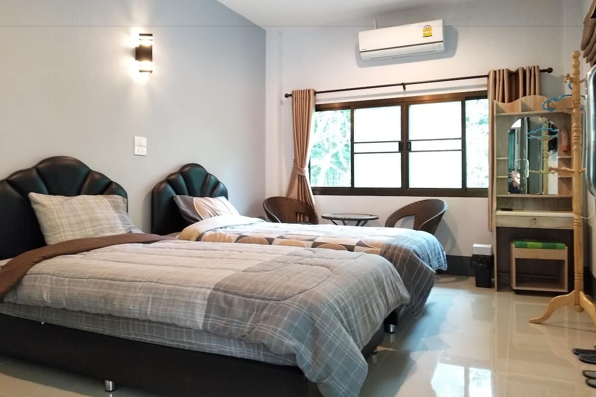 Twin kamer | Een minibar, geluiddichte muren, gratis wifi