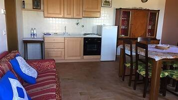 Apartment, 1 Bedroom, Ground Floor (Apt 8) | Living area | Flat-screen TV