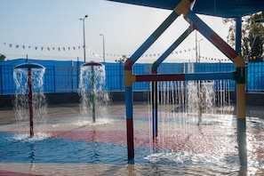 Outdoor pool, open 11:00 AM to 5:00 PM, pool loungers