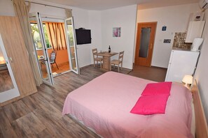 Studio, Terrace | Living area | Flat-screen TV