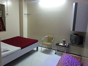 Deluxe Room, Smoking (with AC) | Desk, rollaway beds, free WiFi