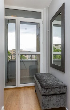 Apartamento, 1 quarto, vista para o jardim | Área de estar | TV de tela plana