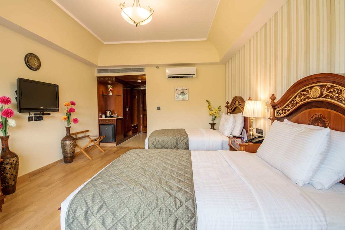 Habitación Deluxe con 2 camas individuales | 1 habitación, ropa de cama de alta calidad y minibar