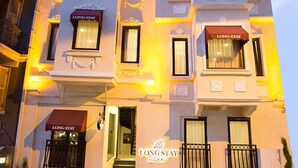 A multi-story building with "LONG STAY" signage on each window. - Long Stay Istanbul (Istanbul)