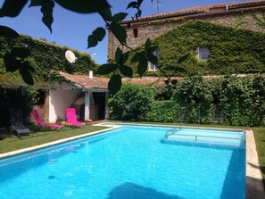 Outdoor pool, pool umbrellas, pool loungers