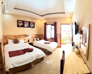 Family Twin Room | 1 bedroom, desk, laptop workspace, blackout drapes