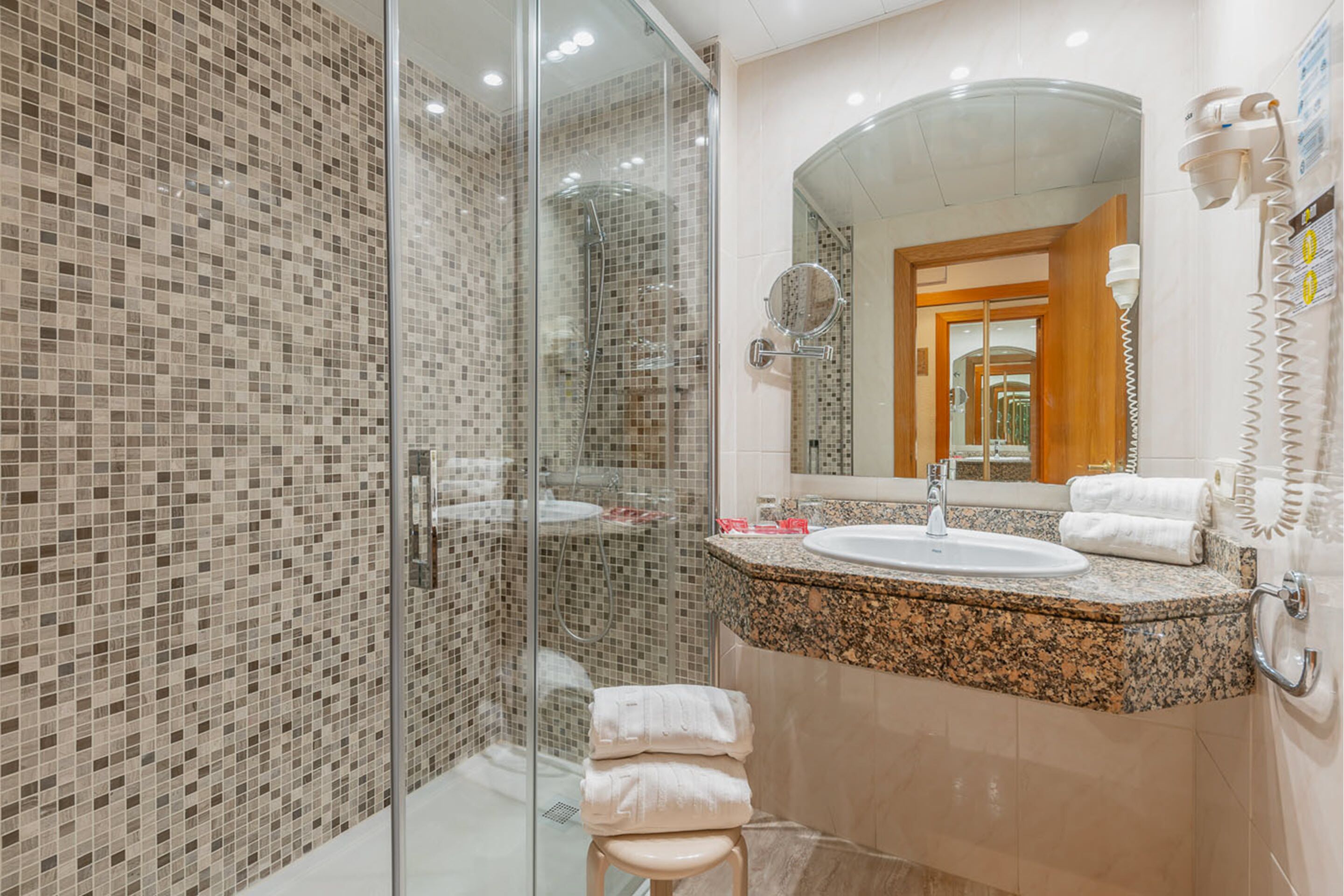 shower, eco-friendly toiletries, hair dryer, towels