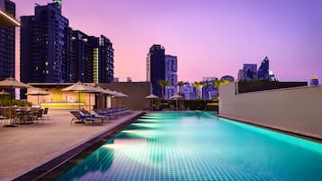 Outdoor pool, open 6:00 AM to 10:00 PM, pool umbrellas, pool loungers