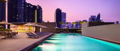 Outdoor pool, open 6:00 AM to 10:00 PM, pool umbrellas, sun loungers
